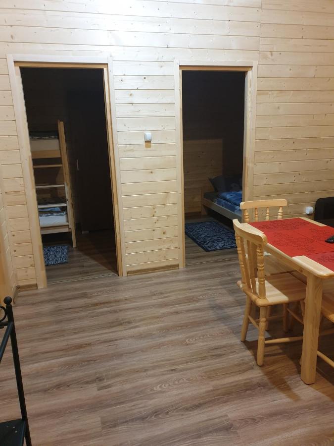 Domki Letniskowe Pod Lasem Koziniec Esterno foto